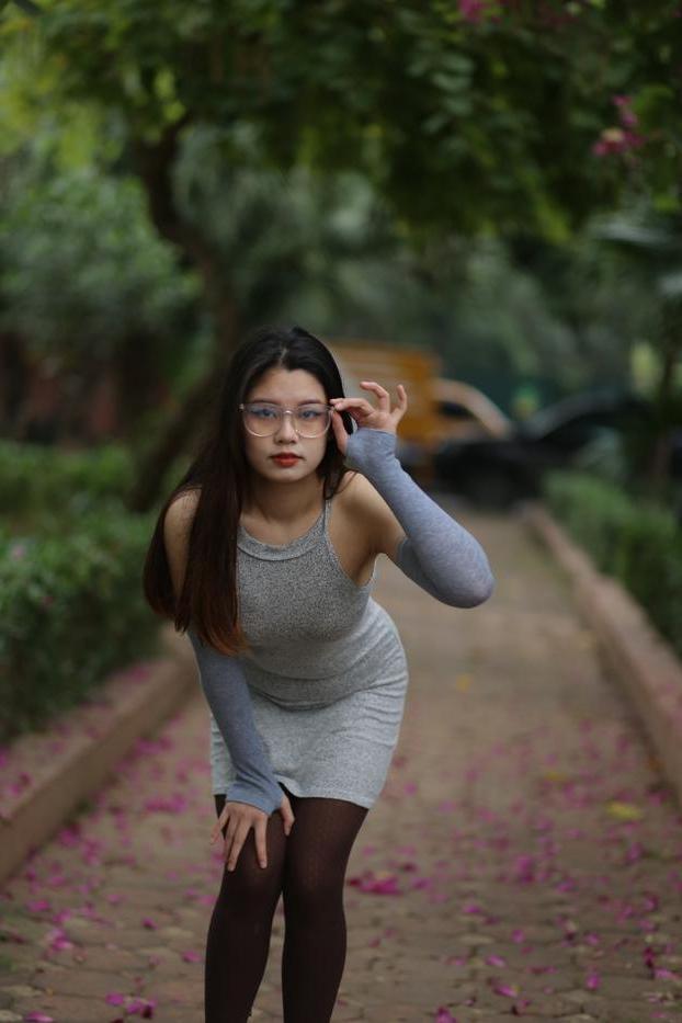 20P Slutty Asian babe with glasses Natalia posing in her provocative outfit