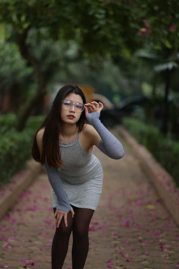 20P Slutty Asian babe with glasses Natalia posing in her provocative outfit