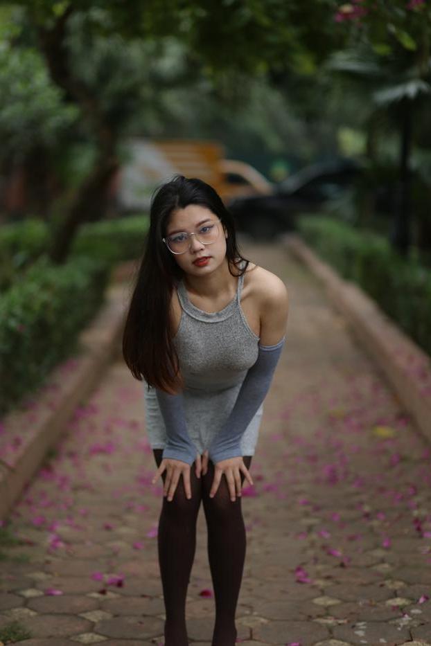 20P Slutty Asian babe with glasses Natalia posing in her provocative outfit