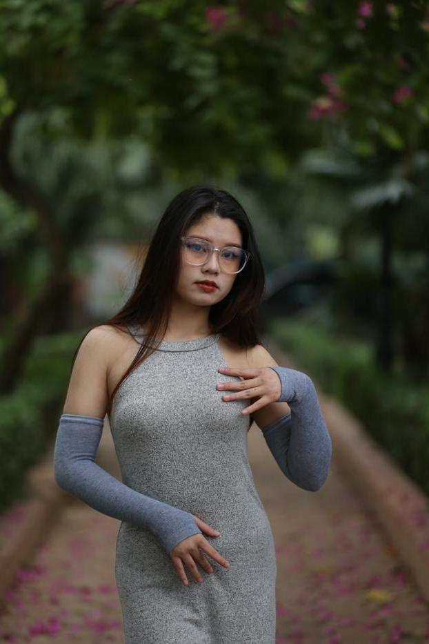 20P Slutty Asian babe with glasses Natalia posing in her provocative outfit