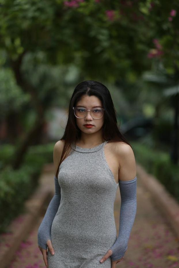 20P Slutty Asian babe with glasses Natalia posing in her provocative outfit