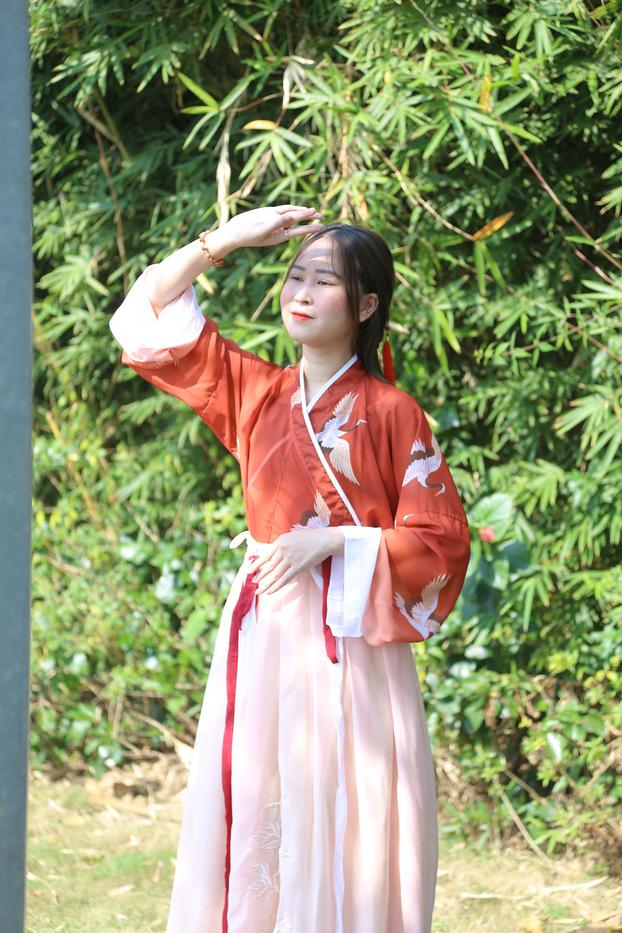 20P Glamorous Asian girl posing in her traditional Chinese outfit in nature