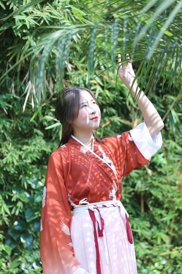 20P Glamorous Asian girl posing in her traditional Chinese outfit in nature