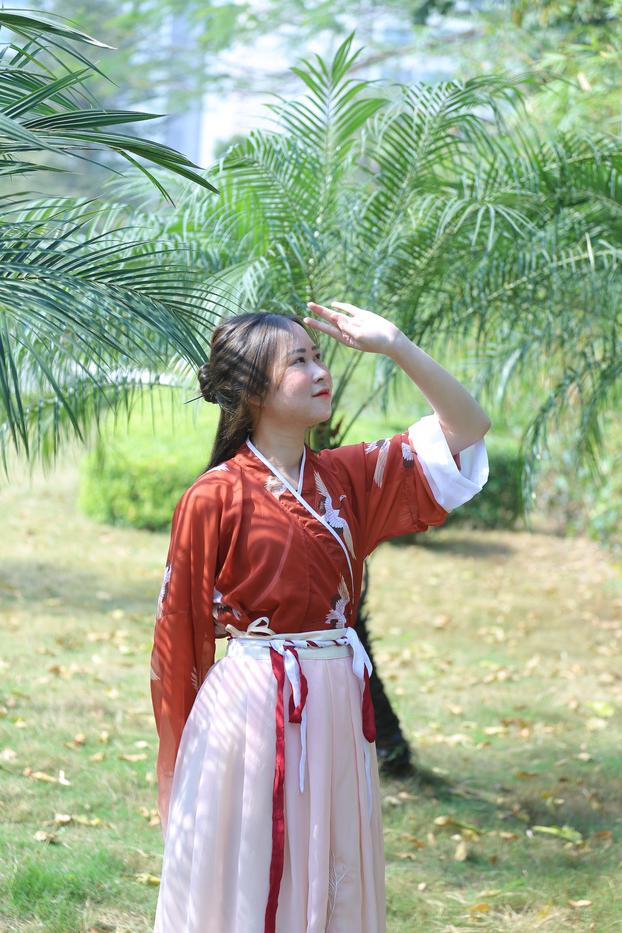 20P Glamorous Asian girl posing in her traditional Chinese outfit in nature