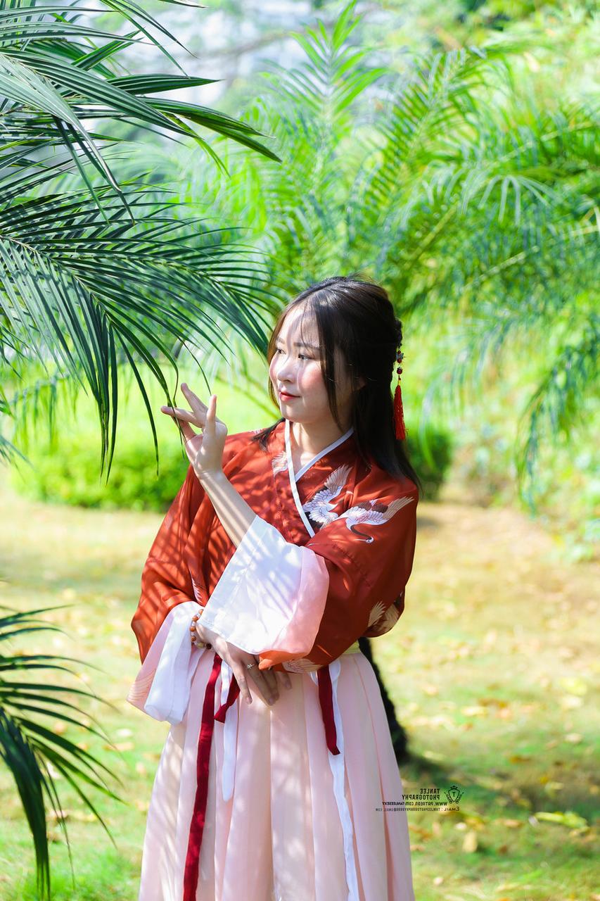20P Glamorous Asian girl posing in her traditional Chinese outfit in nature