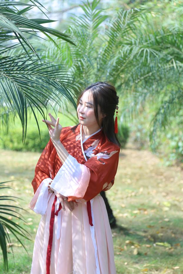 20P Glamorous Asian girl posing in her traditional Chinese outfit in nature