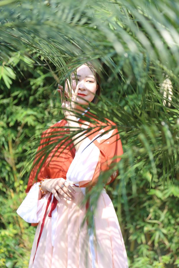 20P Glamorous Asian girl posing in her traditional Chinese outfit in nature