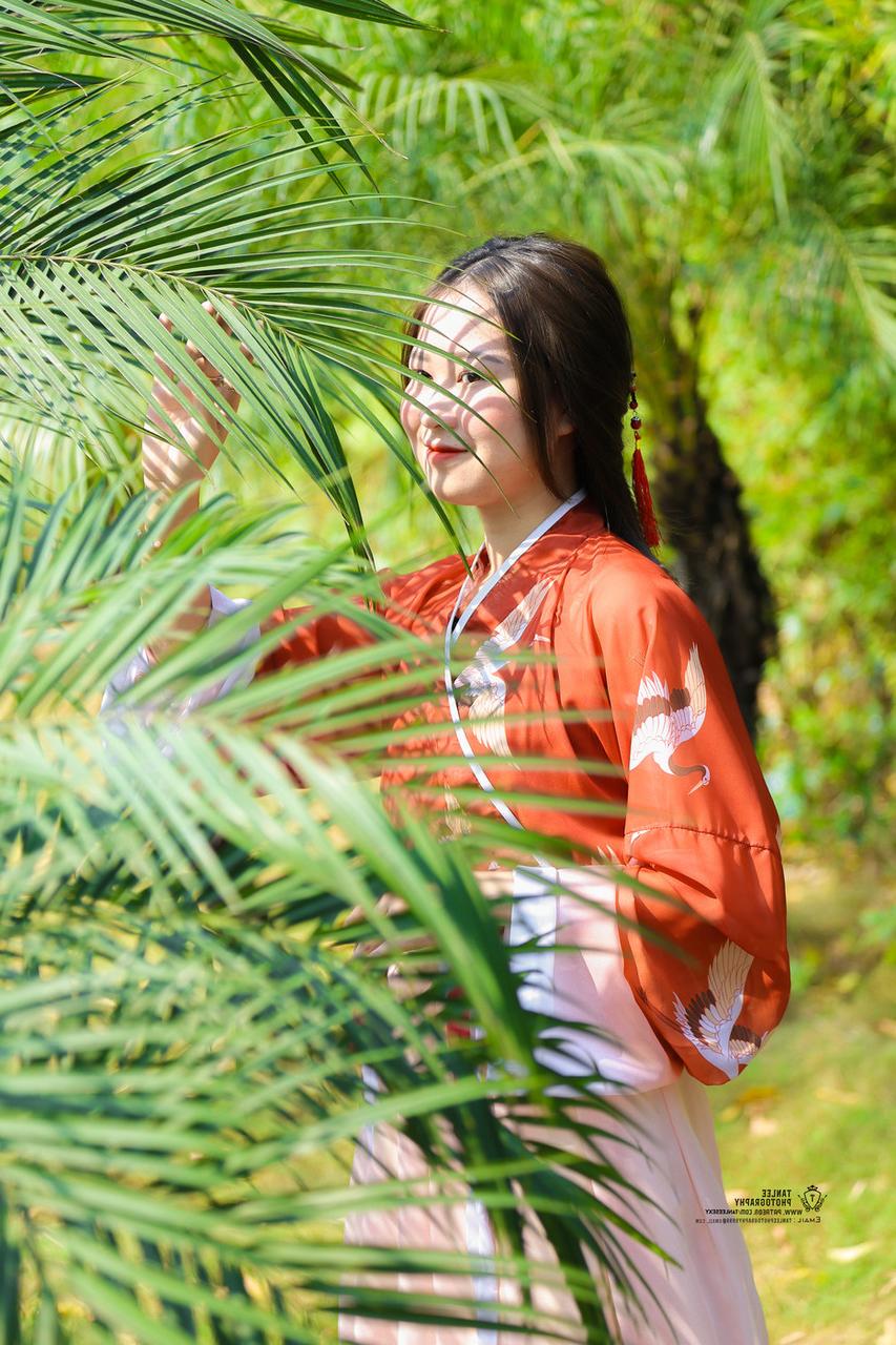 20P Glamorous Asian girl posing in her traditional Chinese outfit in nature