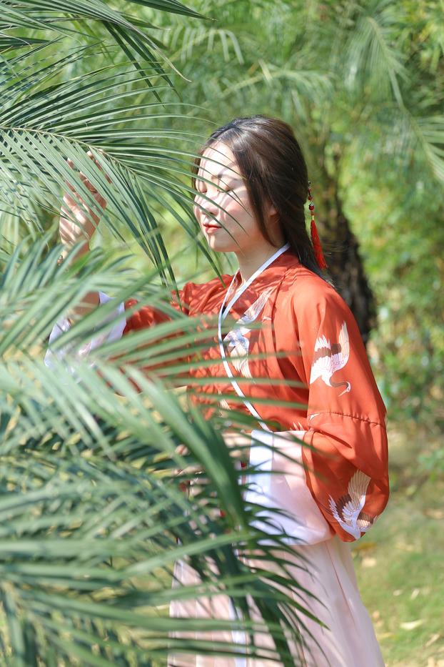 20P Glamorous Asian girl posing in her traditional Chinese outfit in nature