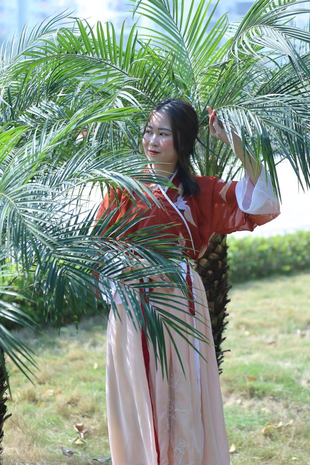 20P Glamorous Asian girl posing in her traditional Chinese outfit in nature