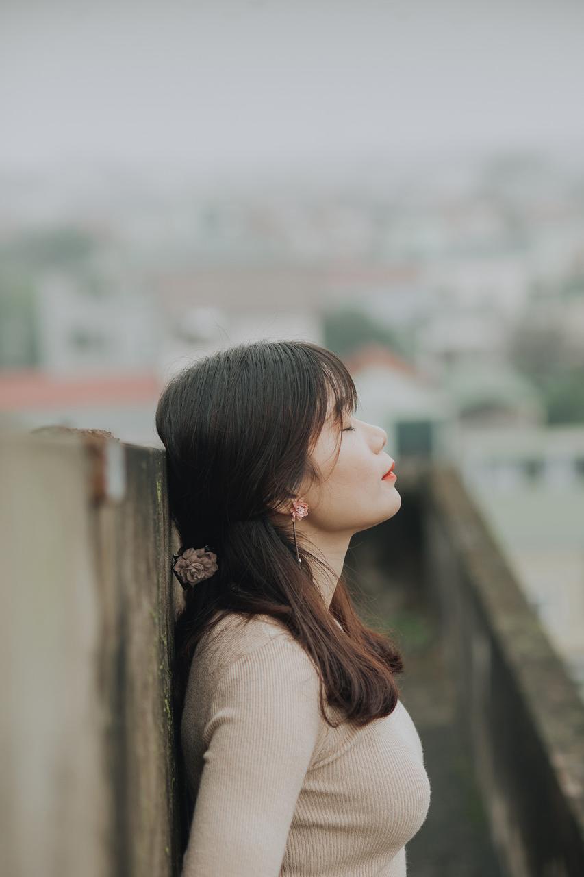 20P Dark-haired Asian sweetheart with red lipstick poses seductively in public