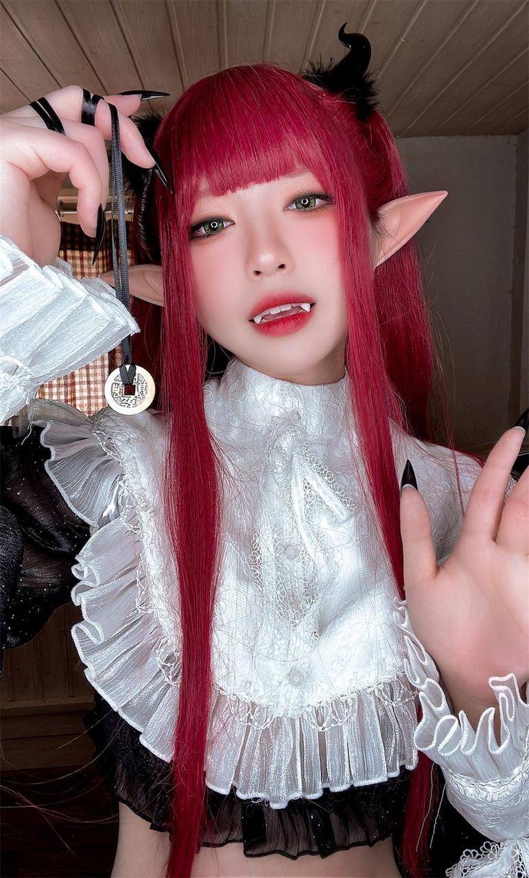 10P Redhead Asian babe with pointy ears Liz poses in a seductive lingerie