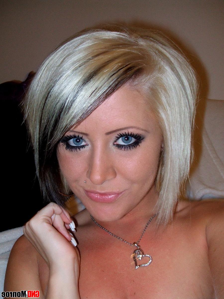12P Platinum blonde takes self shots while exposing her tits in white underwear
