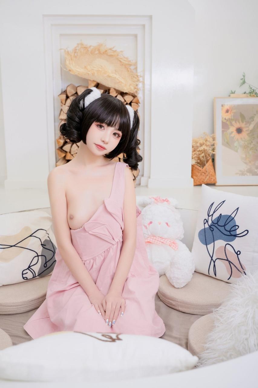 10P Pretty Asian babe shows her lovely teen tits while teasing in a sexy dress