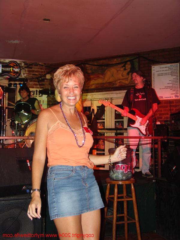 20P Amateur swinger with big tits Tracy Lick exposes her attributes in a night bar