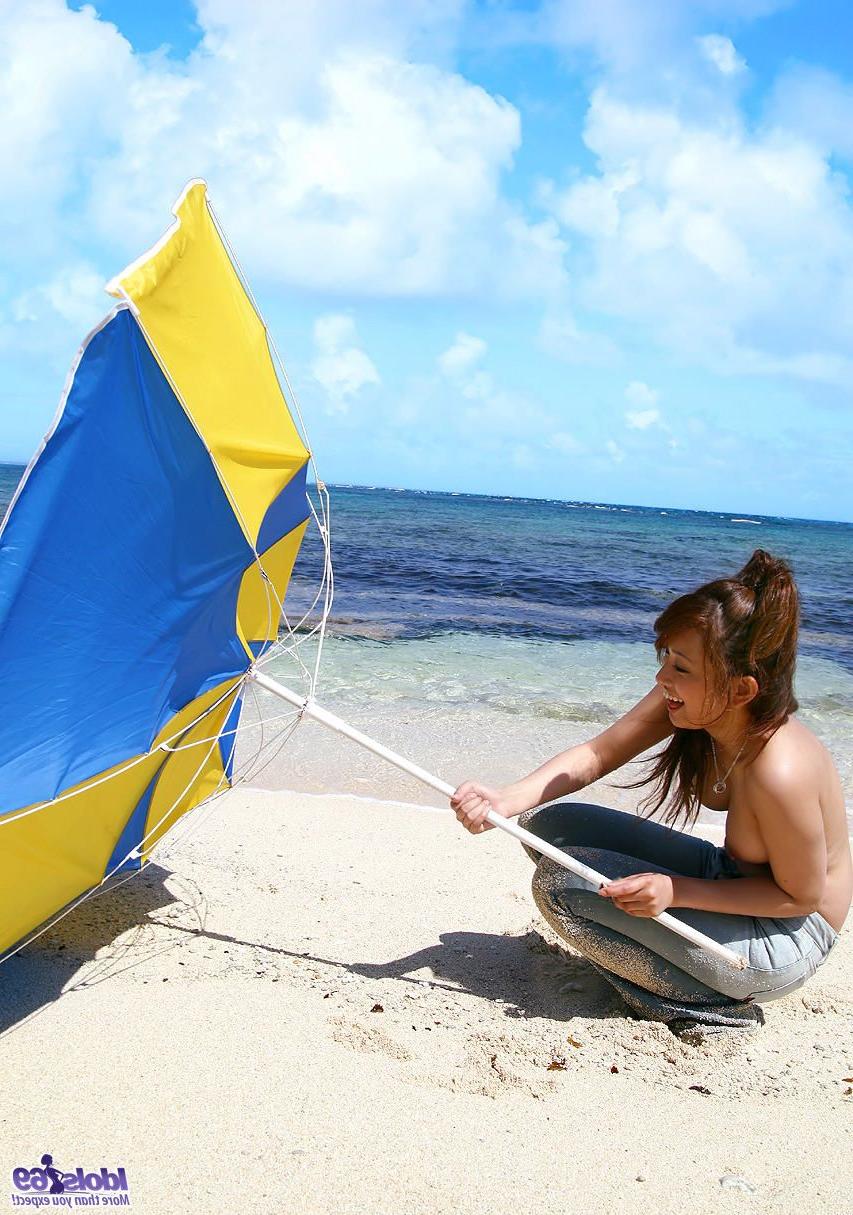 16P Japanese model Nao Yoshizaki goes skinny dipping while hanging at the beach