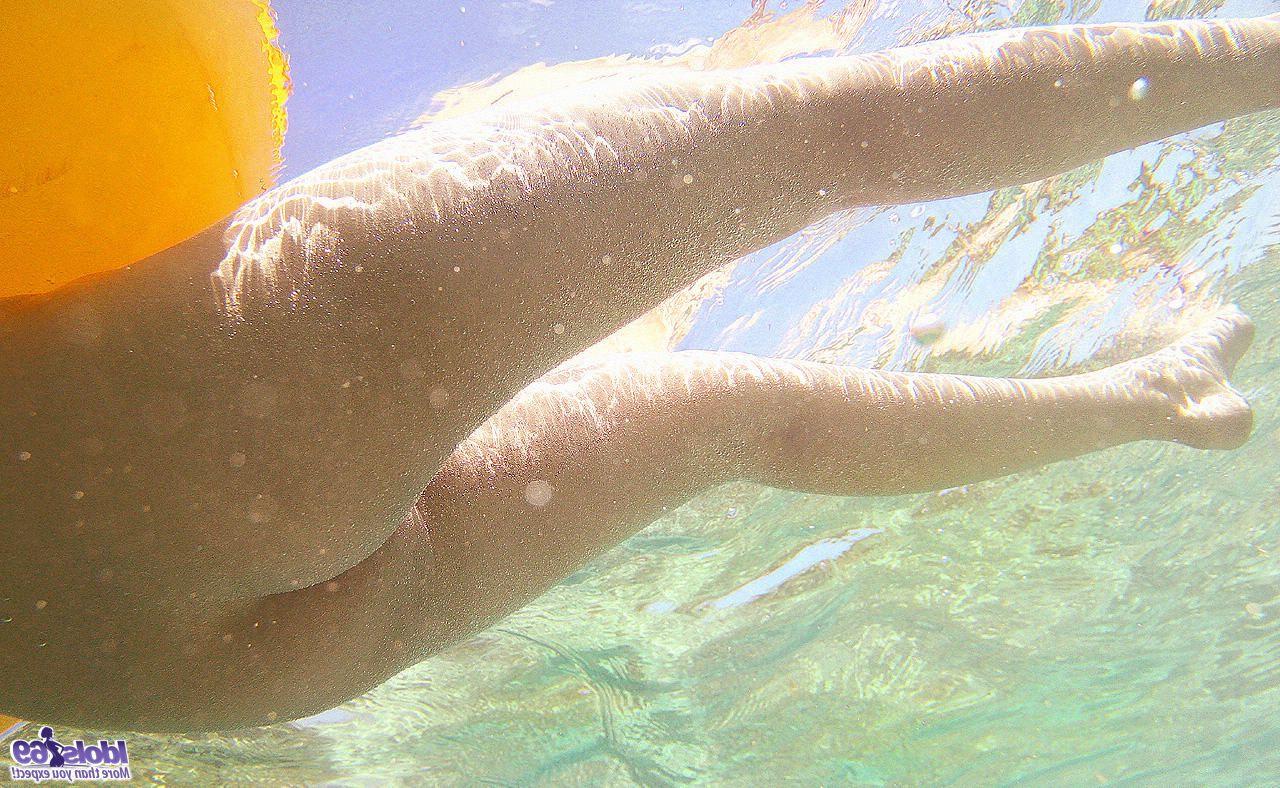 16P Japanese model Nao Yoshizaki goes skinny dipping while hanging at the beach