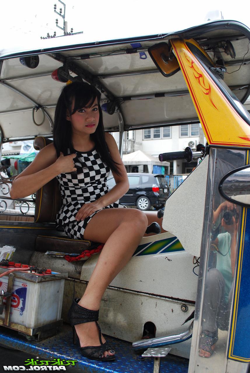 20P Beautiful Asian girl Pai enjoys a big dick after a sexy striptease on the bed