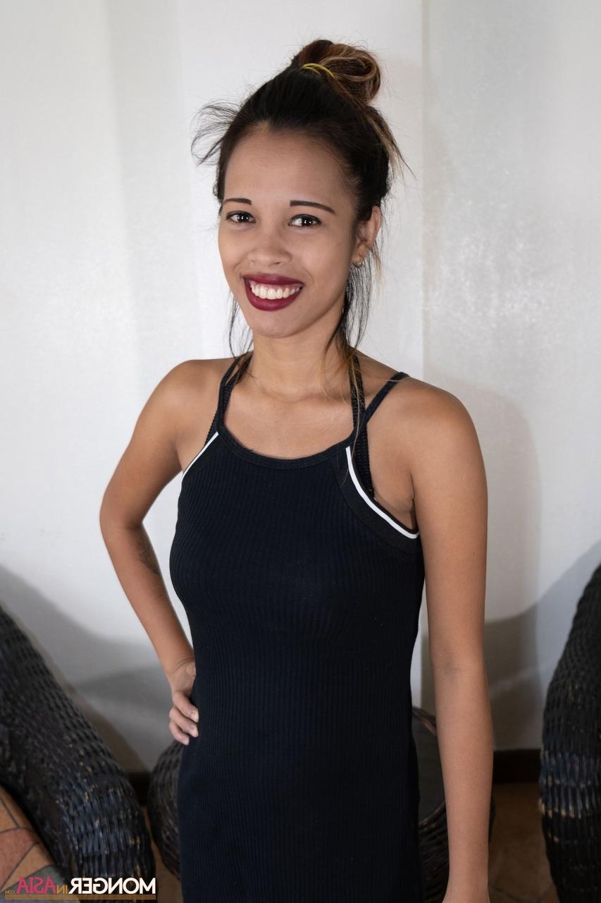 20P Sweet Asian babe Irene doffs her clothes and shows her big tits in a solo