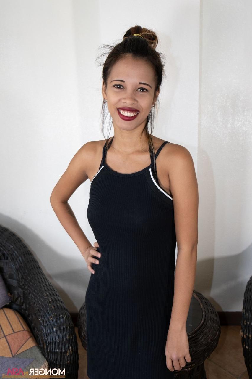 20P Sweet Asian babe Irene doffs her clothes and shows her big tits in a solo