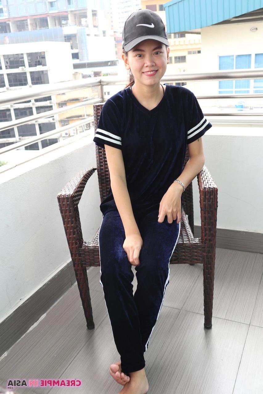 20P Attractive Asian Sprite strips and shows her big tits & pussy at a casting