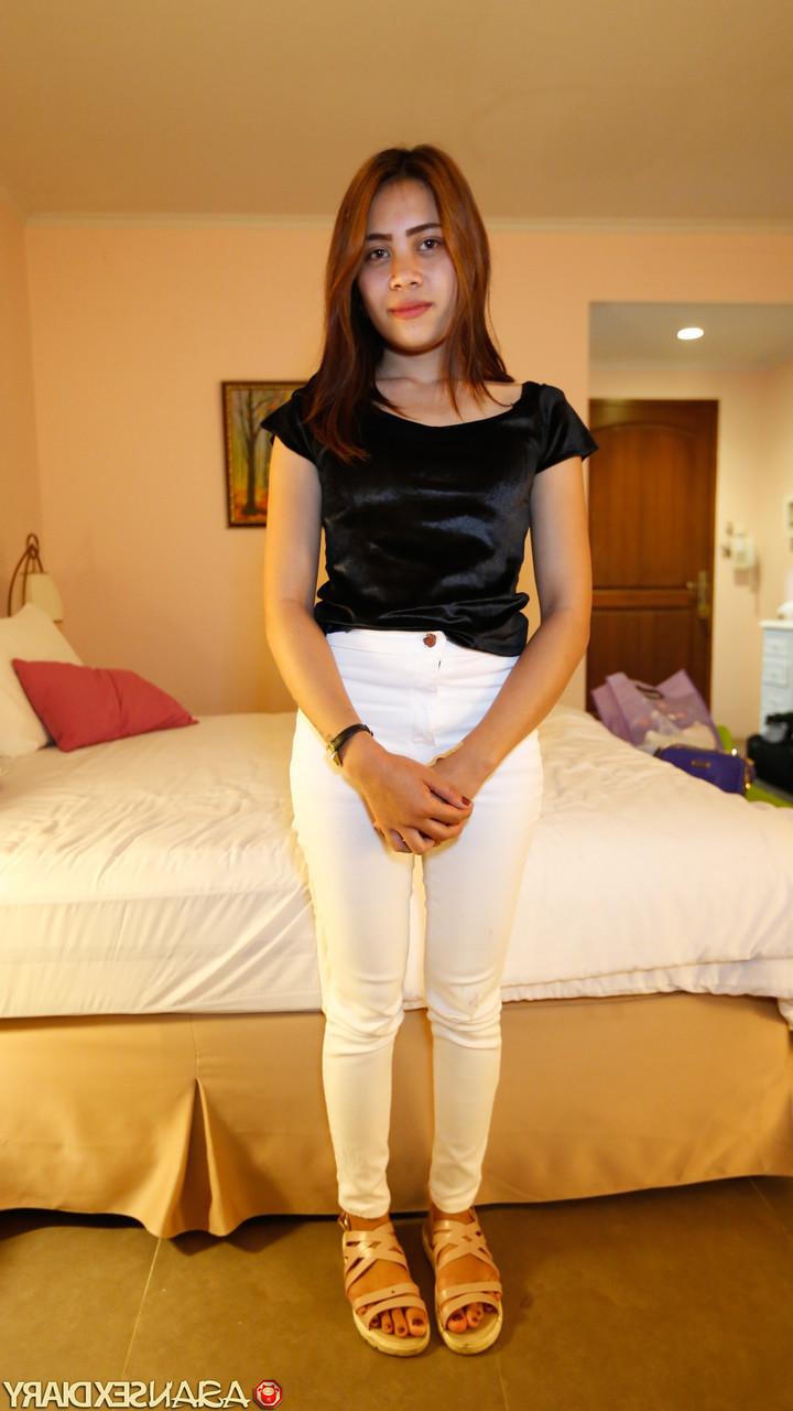 20P Asian babe Evi B gives a big dick a ride after a sexy striptease
