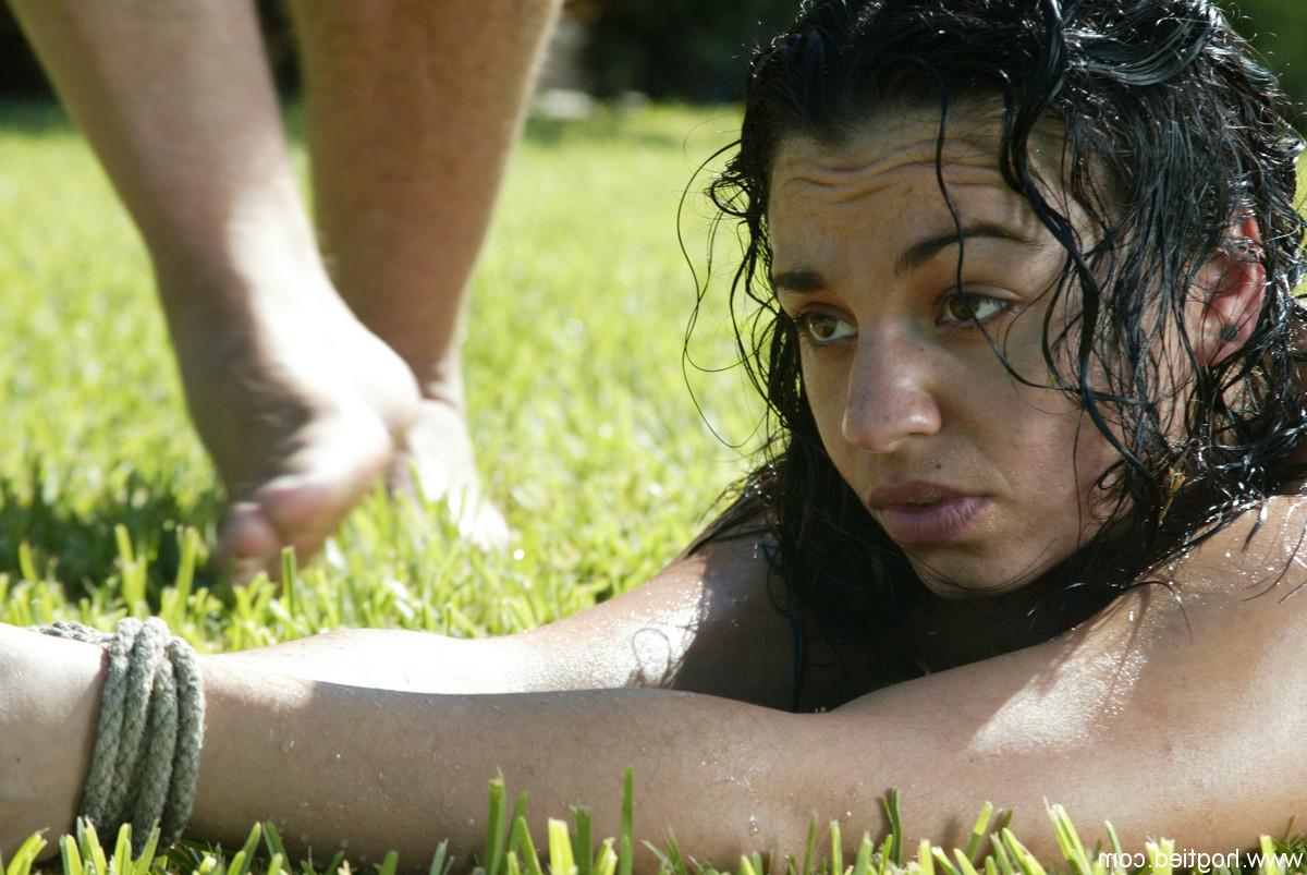 20P Naked babes endure corporal punishment in rope bondage outdoors
