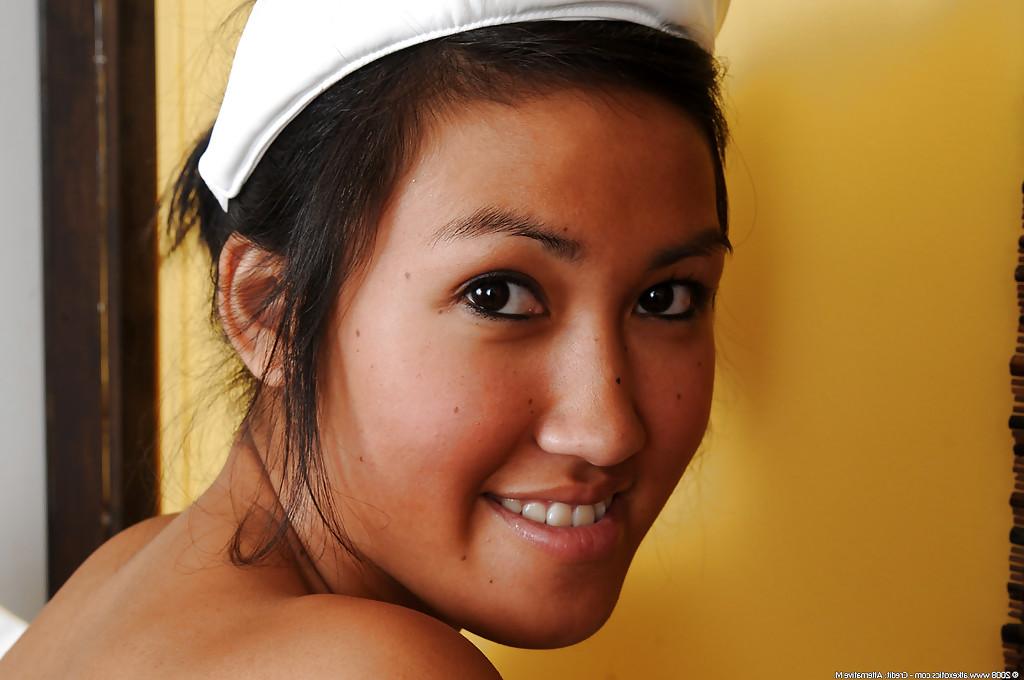 16P Petite Cambodian first timer Julie baring tiny tits and masturbating