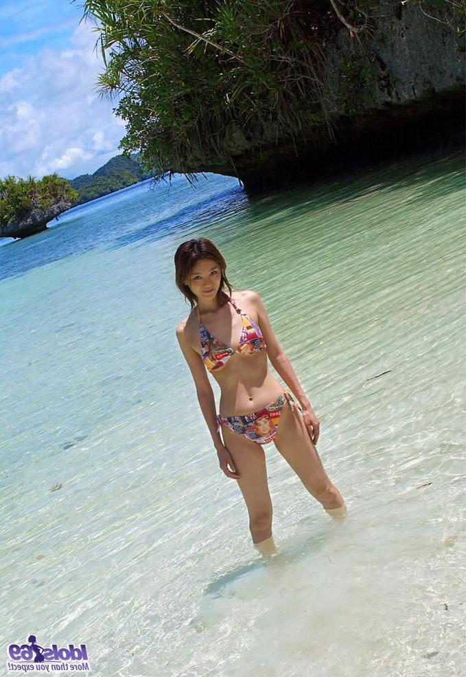 16P Japanese redhead Ray Ito goes totally naked on a tropical beach by herself