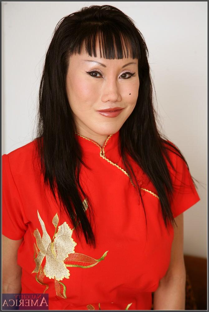 20P Glamorous Asian MILF Gin Fong strips her traditional outfit for a POV fuck