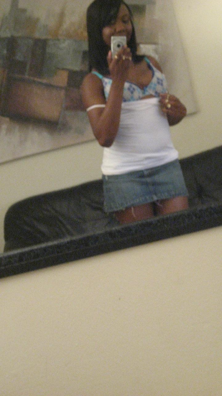 20P Ebony hottie Elisha Turner strips and shows her natural boobs in the mirror