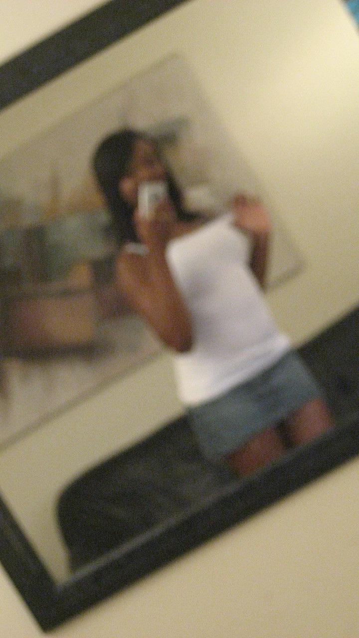 20P Ebony hottie Elisha Turner strips and shows her natural boobs in the mirror