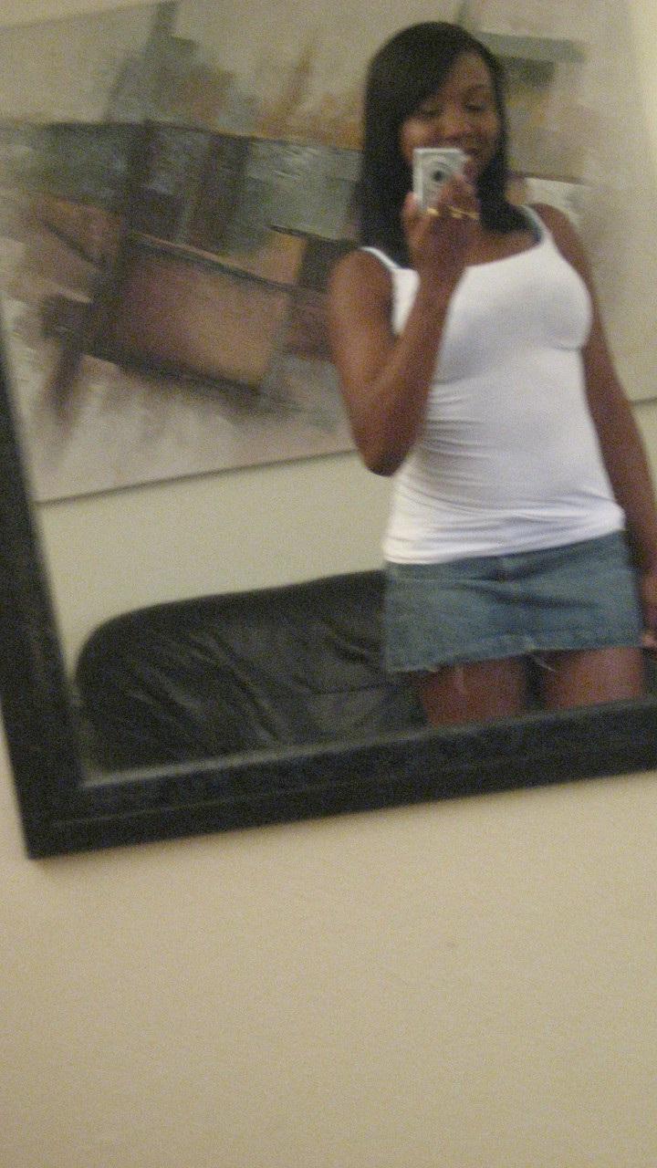 20P Ebony hottie Elisha Turner strips and shows her natural boobs in the mirror