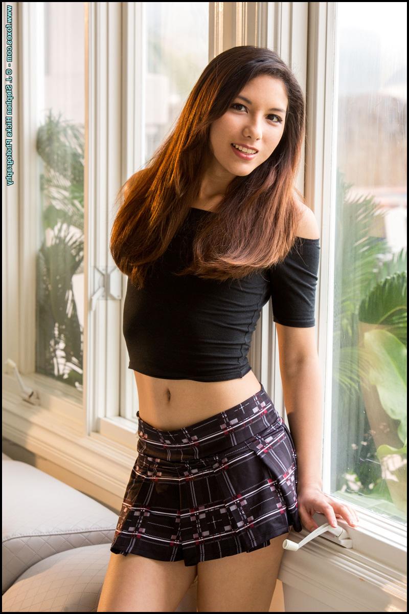15P Pretty Asian girl Melody Wylde spreads her pink pussy after a striptease show