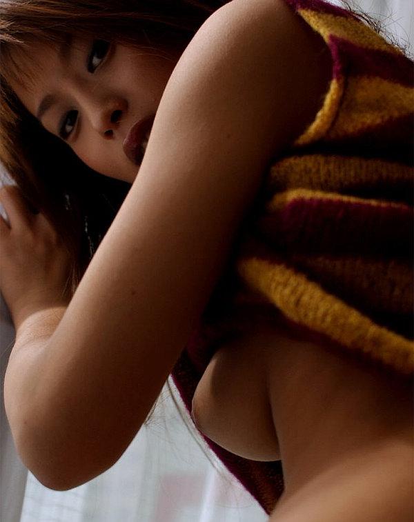16P Redheaded Japanese girl Ryoko Mitake frees her natural tits during solo action