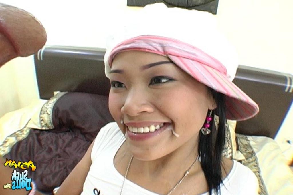 15P Asian hottie Tun takes a cumshot on her pierced tongue from a Farang