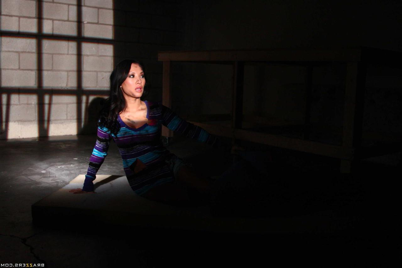17P Black haired Asian hottie Asa Akira dances and teases in a dark room