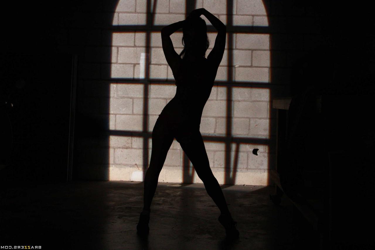 17P Black haired Asian hottie Asa Akira dances and teases in a dark room