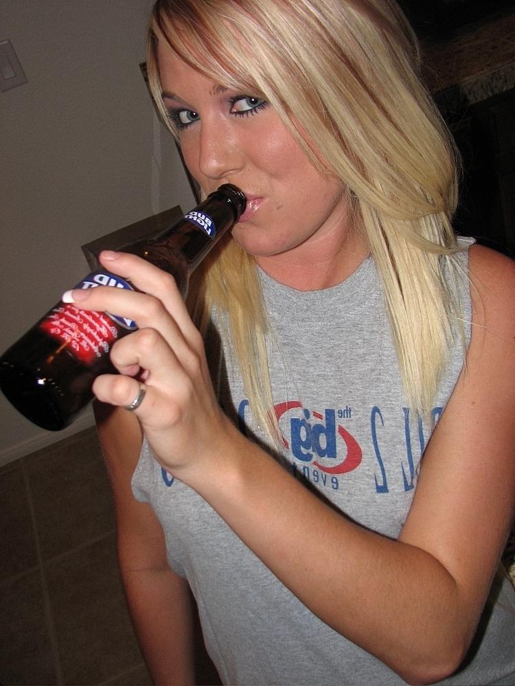 20P Tipsy amateur babe Austin Candid unveils her big tits with pierced nipples