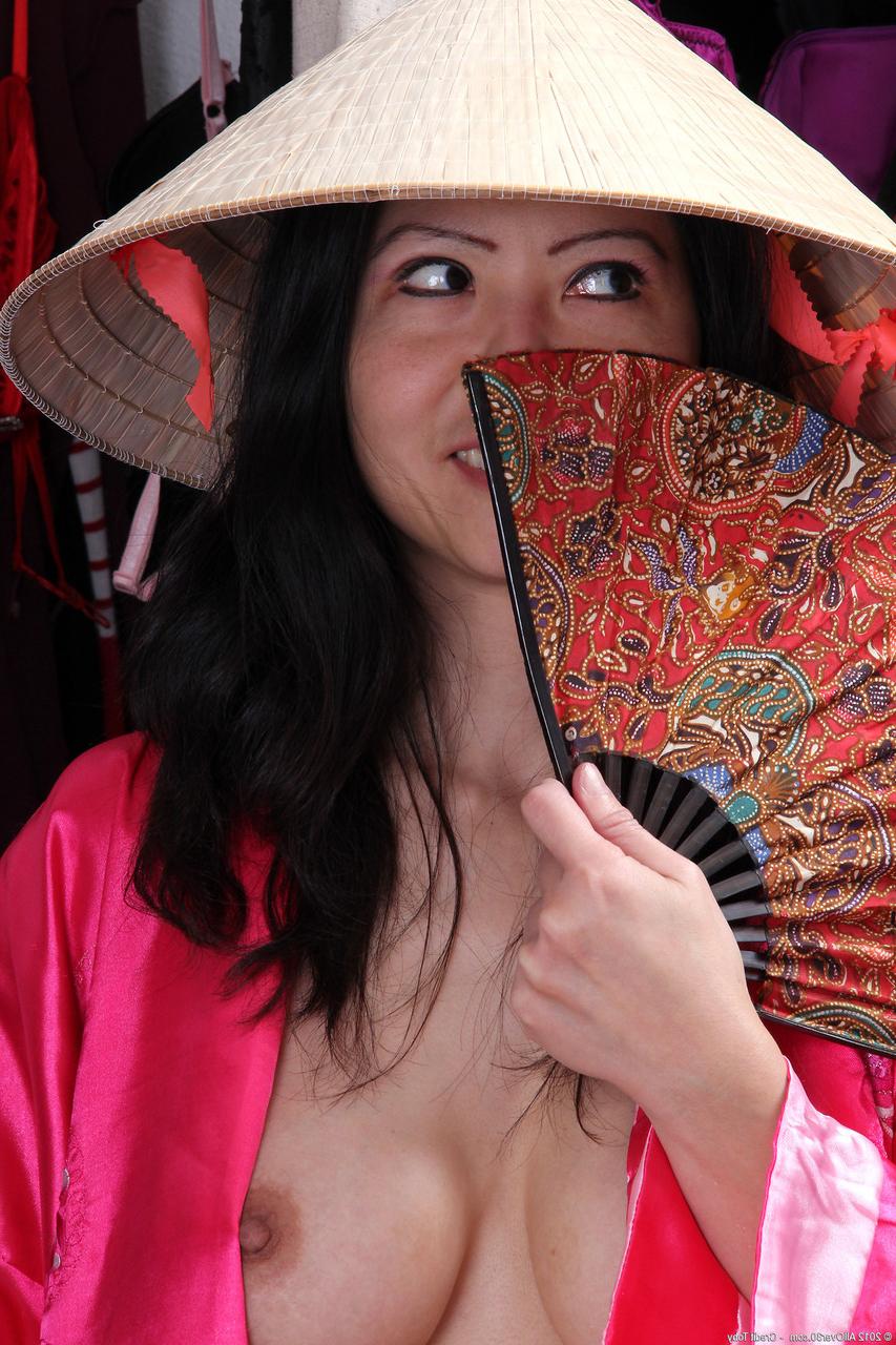 20P Brunette Asian Ruby Grace shows her big tits & rubs her pussy while changing