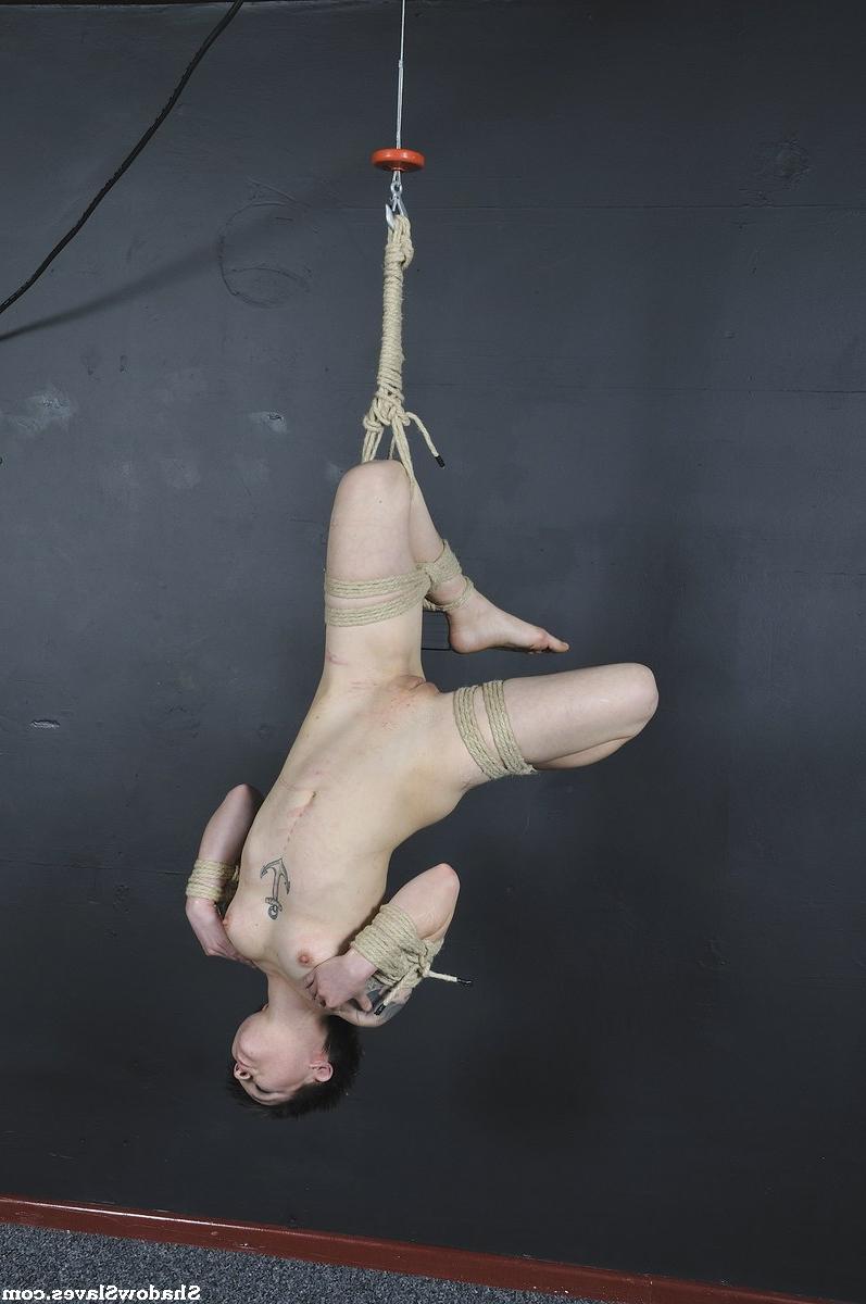 16P Tattooed female is bound with roped and suspended from the ceiling