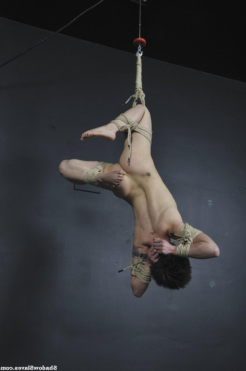 16P Tattooed female is bound with roped and suspended from the ceiling