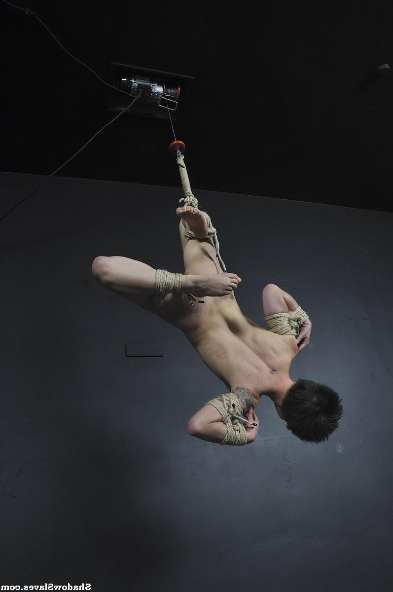 16P Tattooed female is bound with roped and suspended from the ceiling