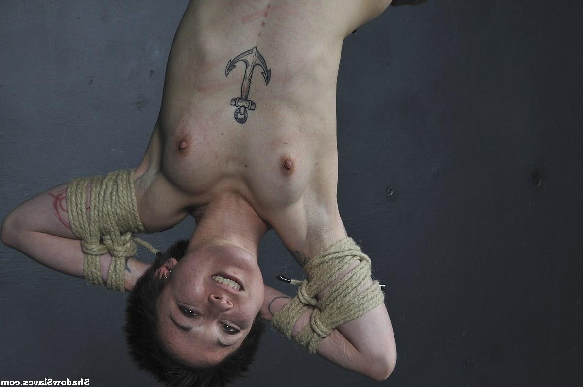 16P Tattooed female is bound with roped and suspended from the ceiling