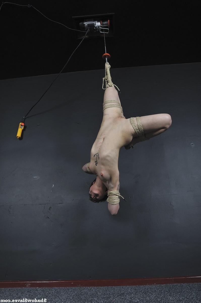 16P Tattooed female is bound with roped and suspended from the ceiling