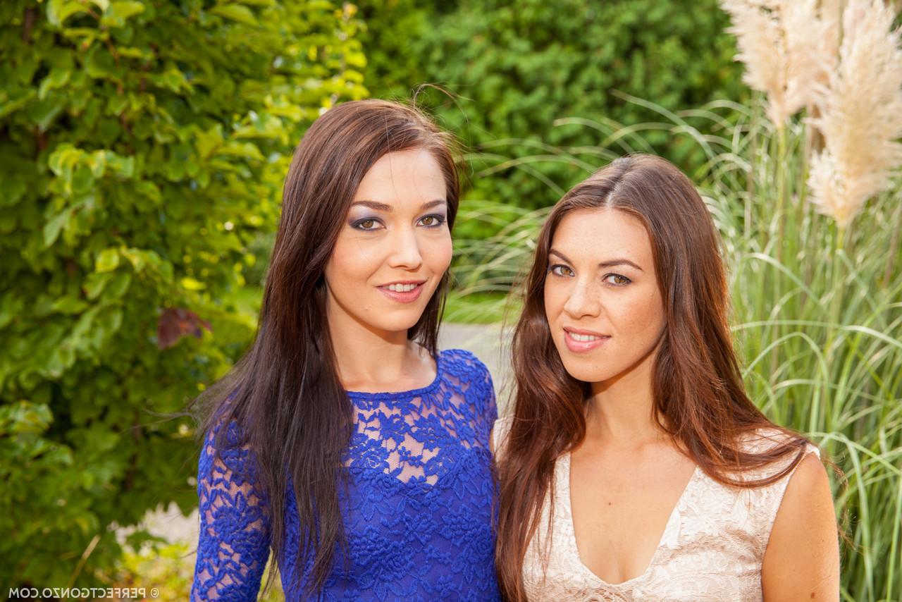 15P Brunette lesbians Angelik and Tiffany model dresses prior to anal play