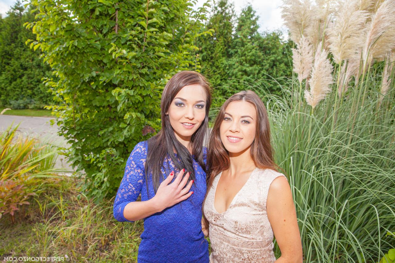 15P Brunette lesbians Angelik and Tiffany model dresses prior to anal play