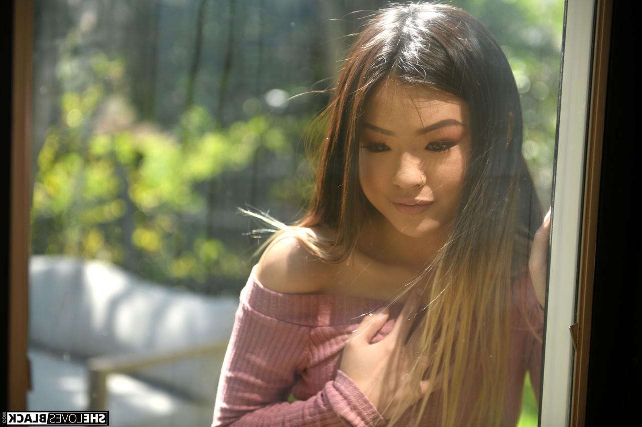 20P Pretty Asian schoolgirl Lulu Chu enjoying a big black cock POV style