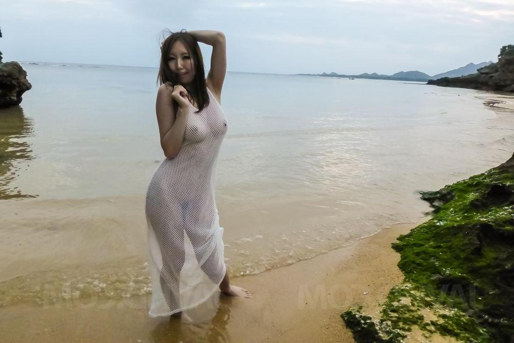 15P Japanese MILF Ruka Ichinose models a see-through gown before sex at the beach