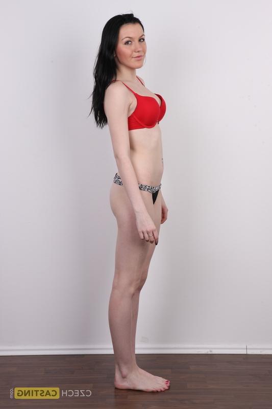 20P Dark-haired amateur Denisa lists to one side while getting totally naked